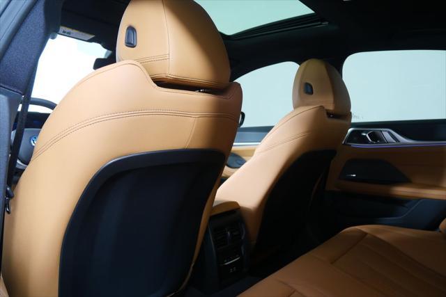 Photo of 2025 Black Sapphire Metallic BMW i4 Gran Coupe