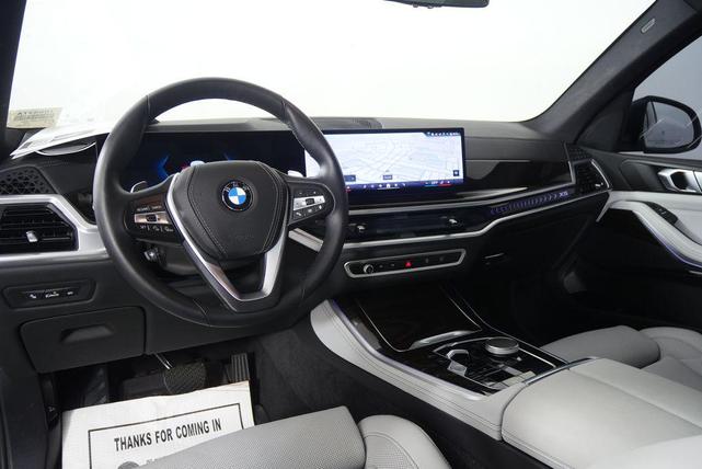 Photo of 2024 Mineral White Metallic BMW X5