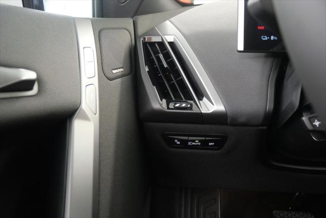 Photo of 2025 Black Sapphire Metallic BMW iX