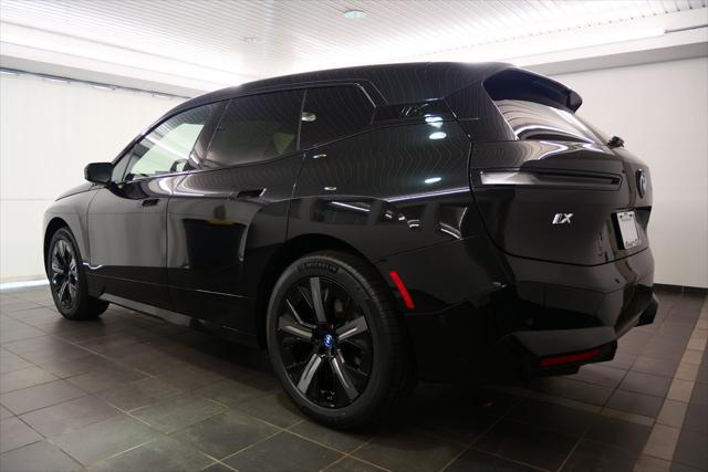 Photo of 2025 Black Sapphire Metallic BMW iX