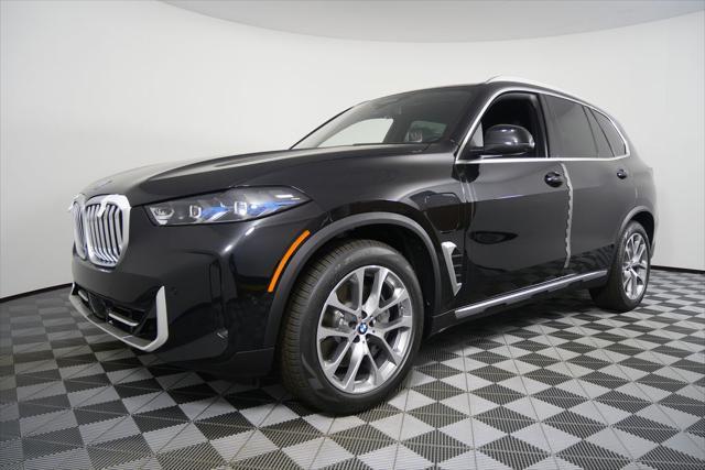 Photo of 2026 Black Sapphire Metallic BMW X5 PHEV