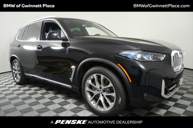 Photo of 2026 Black Sapphire Metallic BMW X5 PHEV