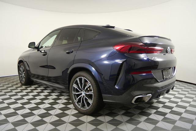 Photo of 2024 Carbon Black Metallic BMW X6