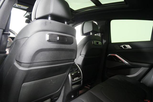 Photo of 2024 Carbon Black Metallic BMW X6