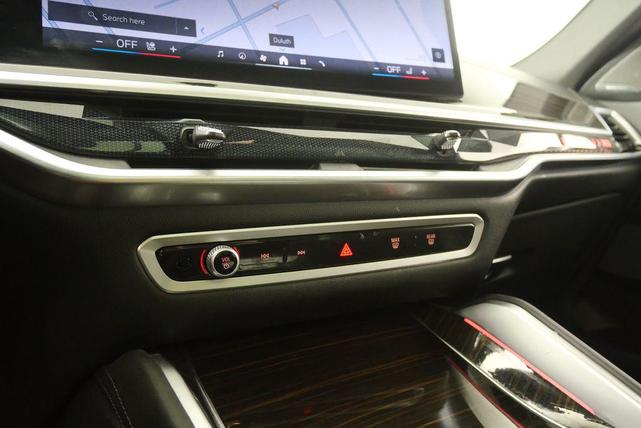 Photo of 2024 Carbon Black Metallic BMW X6