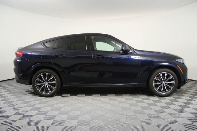 Photo of 2024 Carbon Black Metallic BMW X6