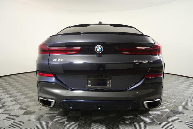 Photo of 2024 Carbon Black Metallic BMW X6