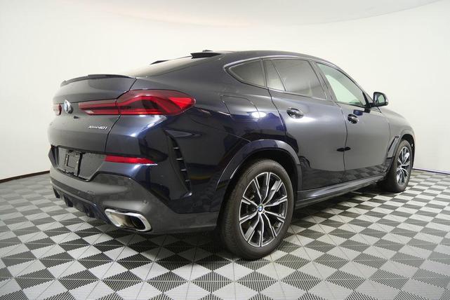 Photo of 2024 Carbon Black Metallic BMW X6