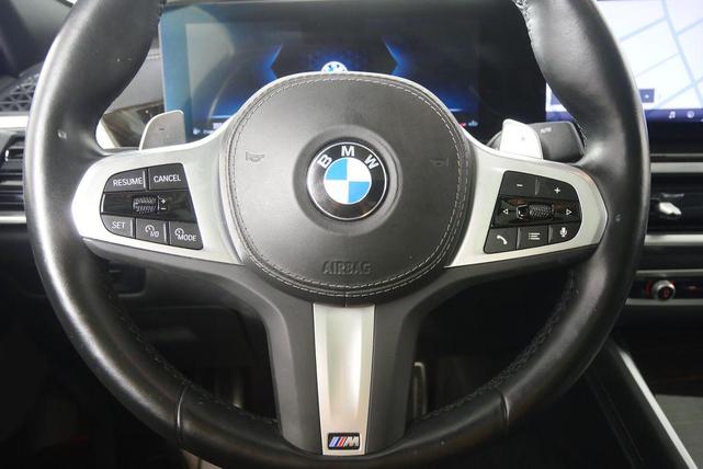 Photo of 2024 Carbon Black Metallic BMW X6