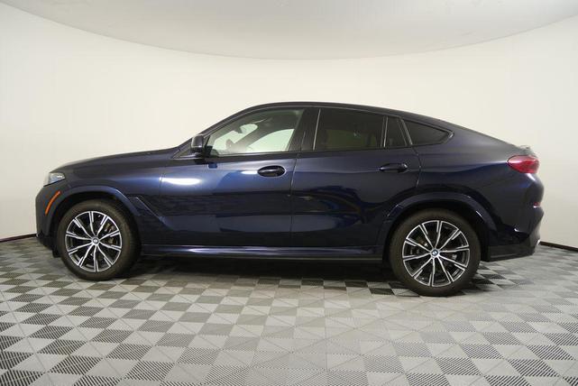 Photo of 2024 Carbon Black Metallic BMW X6