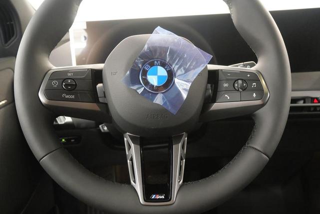 Photo of 2025 Mineral White Metallic BMW iX