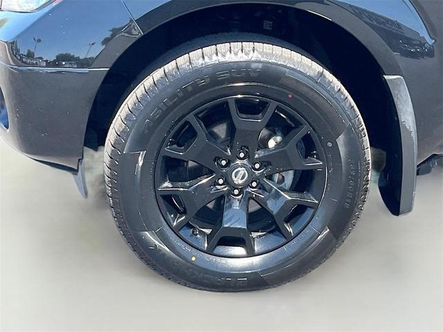 Photo of 2021 Magnetic Black Pearl Nissan Frontier