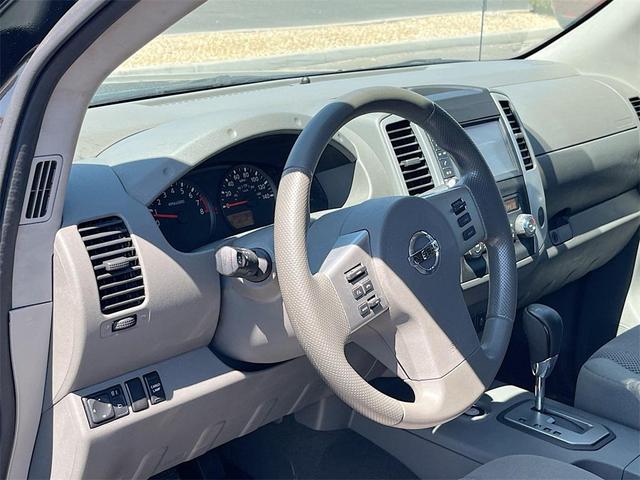 Photo of 2021 Magnetic Black Pearl Nissan Frontier