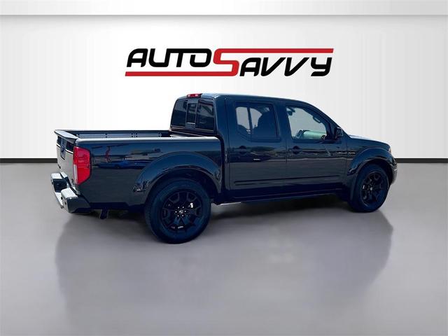 Photo of 2021 Magnetic Black Pearl Nissan Frontier