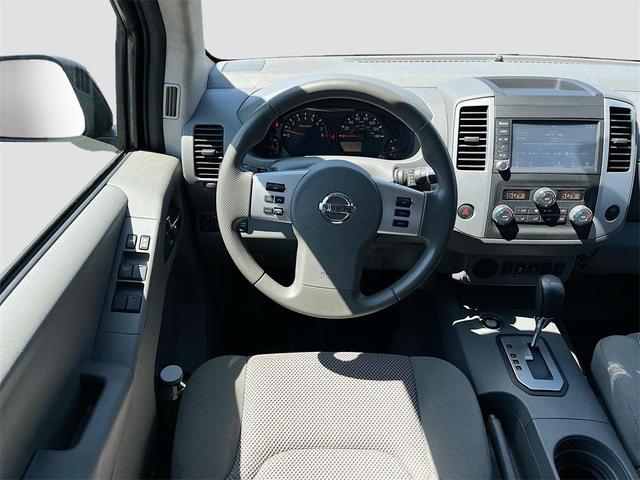 Photo of 2021 Magnetic Black Pearl Nissan Frontier