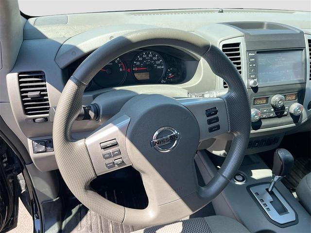Photo of 2021 Magnetic Black Pearl Nissan Frontier
