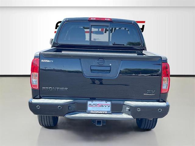Photo of 2021 Magnetic Black Pearl Nissan Frontier