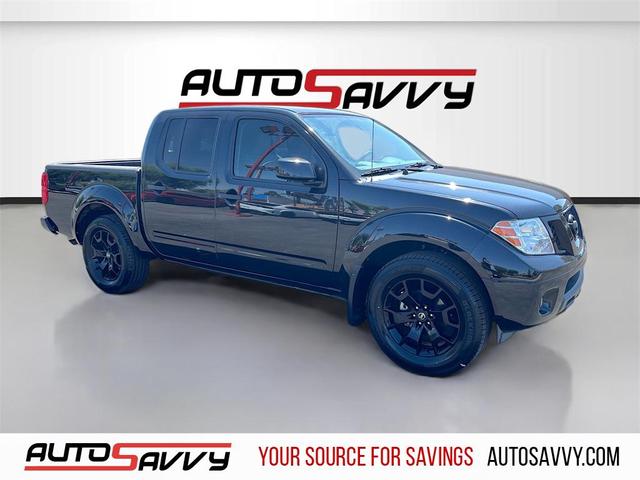 Photo of 2021 Magnetic Black Pearl Nissan Frontier