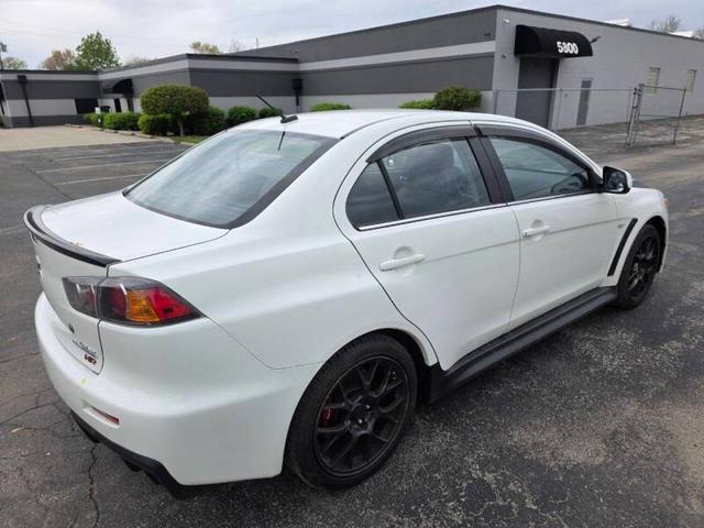 Photo of 2014 White Mitsubishi Lancer Evolution