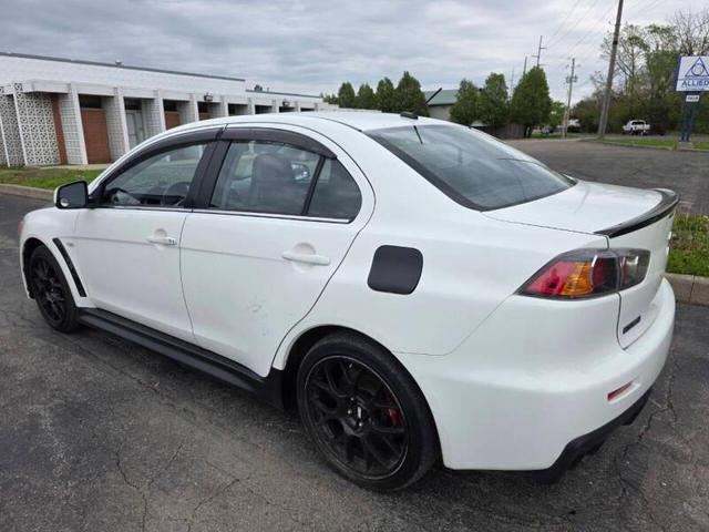 Photo of 2014 White Mitsubishi Lancer Evolution