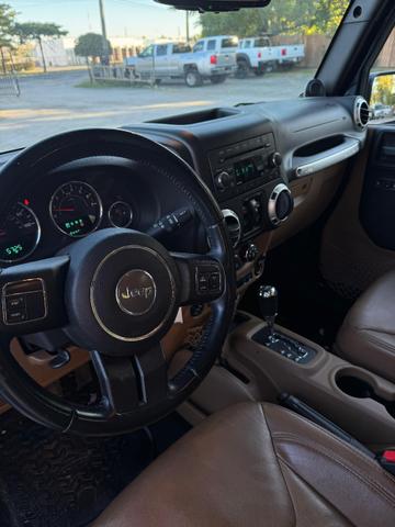 Photo of 2013 BLUE Jeep Wrangler Unlimited