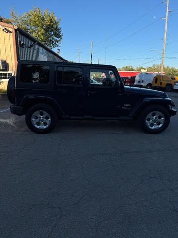Photo of 2013 BLUE Jeep Wrangler Unlimited