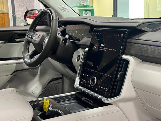 Photo of 2025 Volcanic Red Tintcoat GMC Acadia