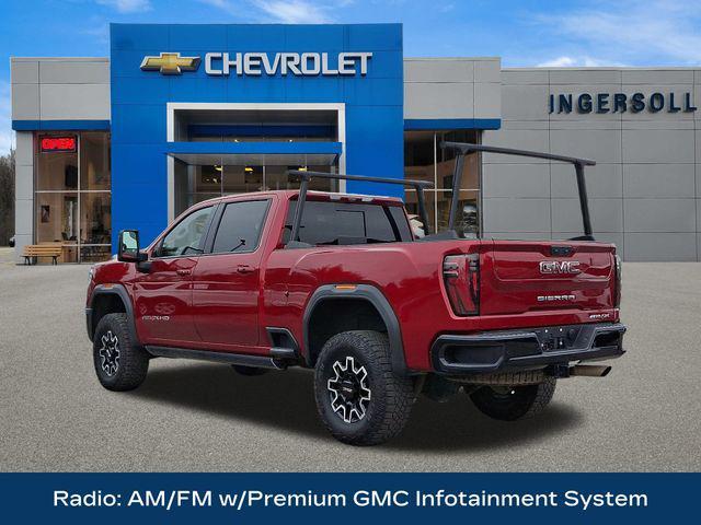 Photo of 2024 Volcanic Red Tintcoat GMC Sierra 2500