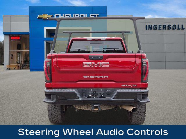 Photo of 2024 Volcanic Red Tintcoat GMC Sierra 2500