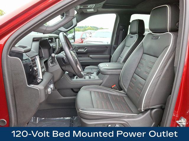 Photo of 2024 Volcanic Red Tintcoat GMC Sierra 2500