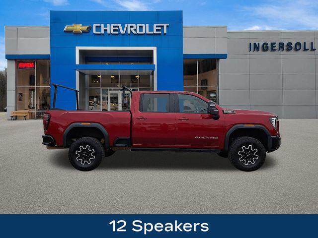 Photo of 2024 Volcanic Red Tintcoat GMC Sierra 2500