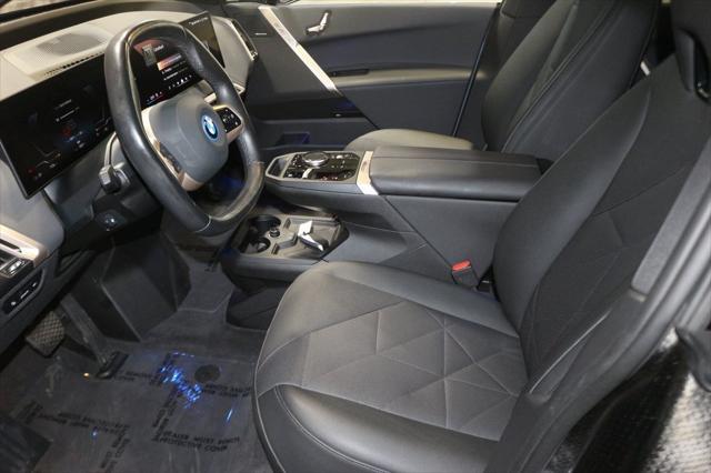 Photo of 2024 Storm Bay Metallic BMW iX