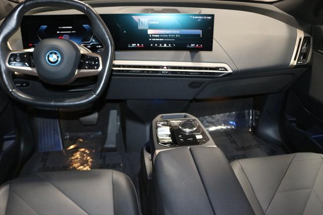 Photo of 2024 Storm Bay Metallic BMW iX