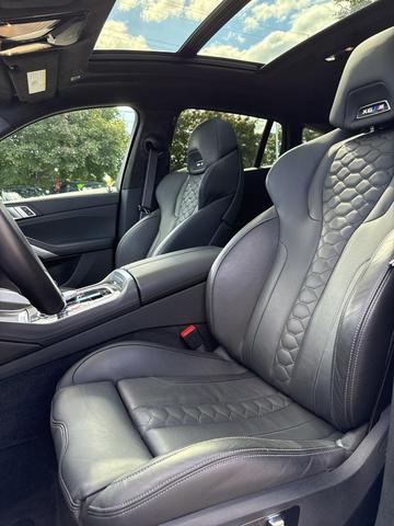 Photo of 2024 Black Sapphire Metallic BMW X6 M