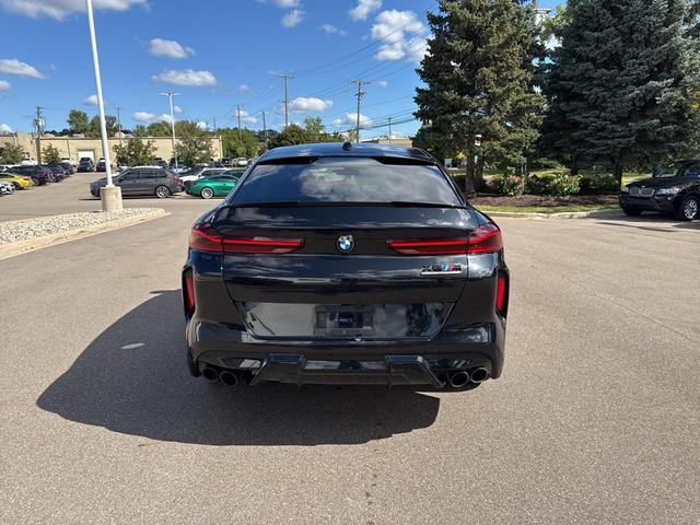 Photo of 2024 Black Sapphire Metallic BMW X6 M
