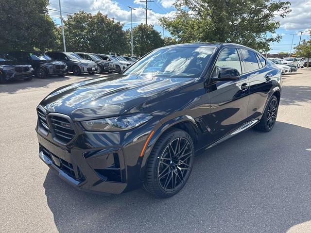 Photo of 2024 Black Sapphire Metallic BMW X6 M