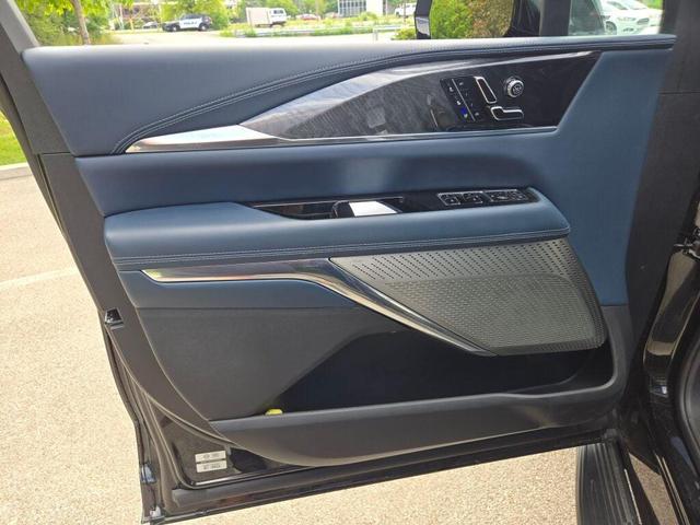 Photo of 2025 Black Raven Cadillac Escalade IQ