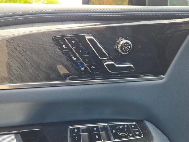 Photo of 2025 Black Raven Cadillac Escalade IQ