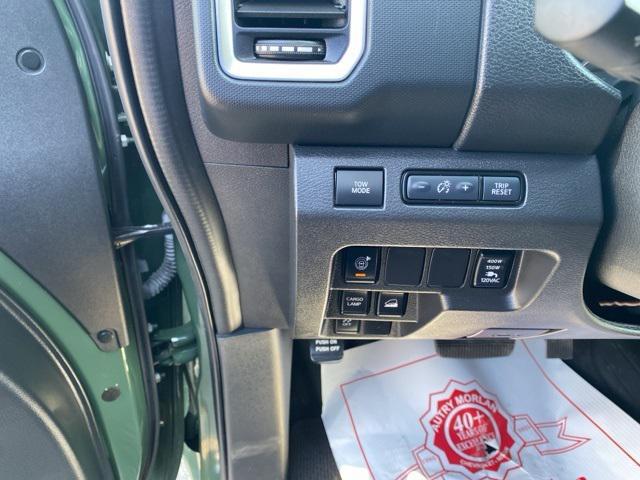 Photo of 2024 Tactical Green Metallic Nissan Frontier