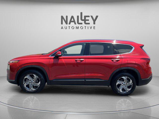 Photo of 2023 Calypso Red Hyundai SANTA FE
