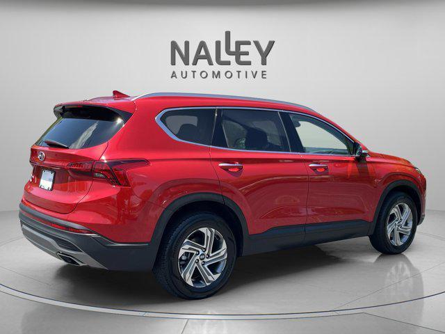 Photo of 2023 Calypso Red Hyundai SANTA FE