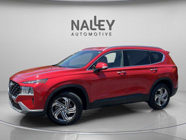Photo of 2023 Calypso Red Hyundai SANTA FE