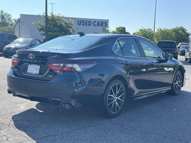 Photo of 2023 Midnight Black Metallic Toyota Camry