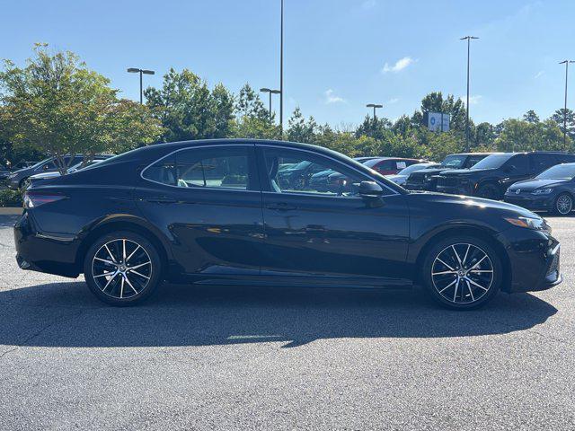 Photo of 2023 Midnight Black Metallic Toyota Camry