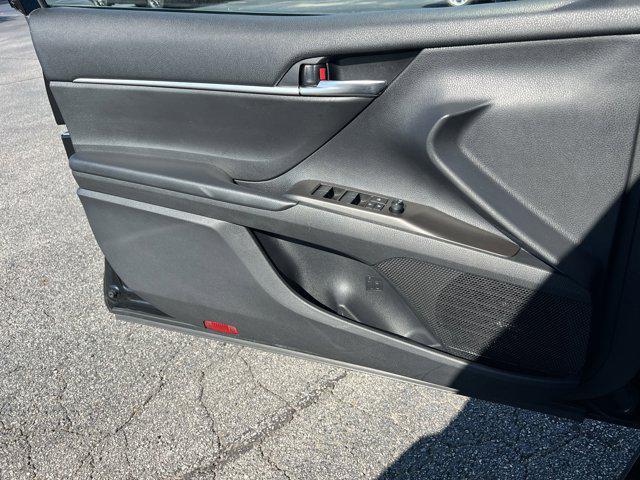 Photo of 2023 Midnight Black Metallic Toyota Camry