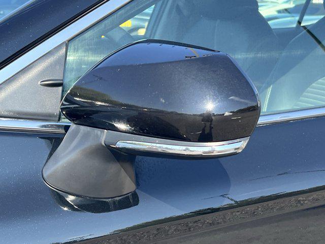 Photo of 2023 Midnight Black Metallic Toyota Camry