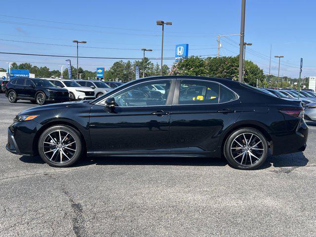 Photo of 2023 Midnight Black Metallic Toyota Camry
