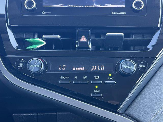 Photo of 2023 Midnight Black Metallic Toyota Camry