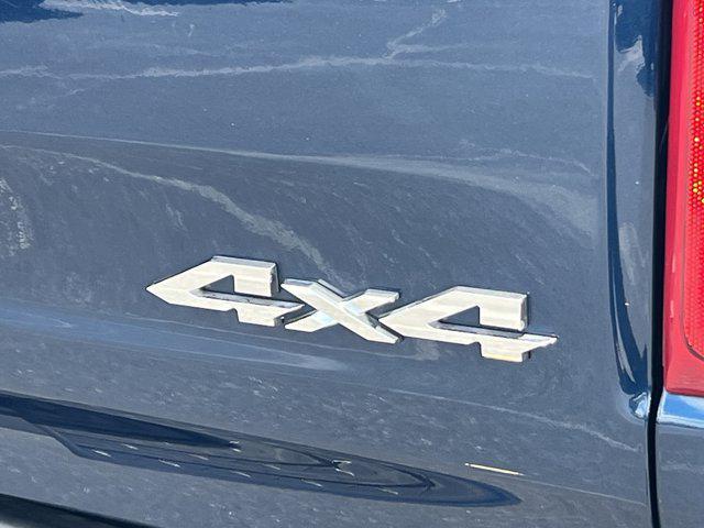 Photo of 2021 Patriot Blue Pearlcoat RAM 1500