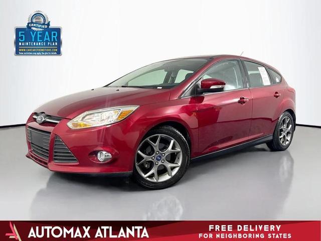 Photo of 2014 Ruby Red Tinted Clearcoat Ford Focus